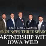 Group of five men in suits standing together, MSMC Injury Lawyers announce partnership with Iowa Wild.
